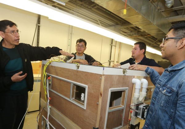 Cal State LA Professor Arturo Pacheco-Vega instructing students in his mechanical engineering class